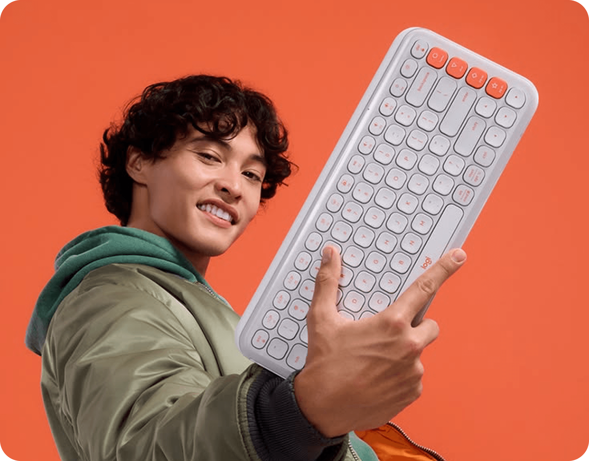 Man holding up a keyboard