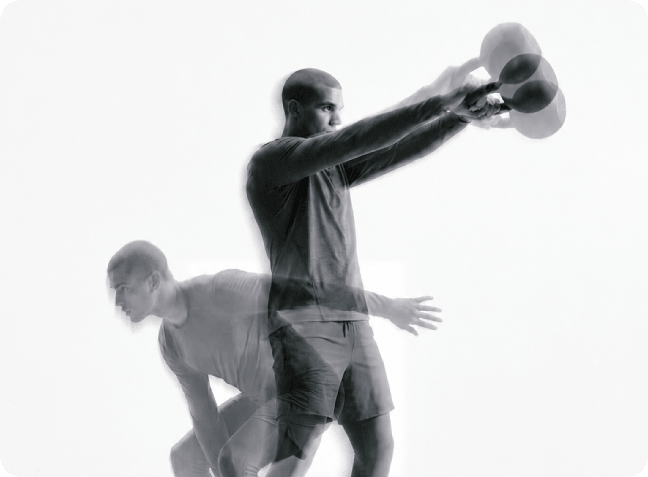 Two athletes in motion, one swinging a kettlebell