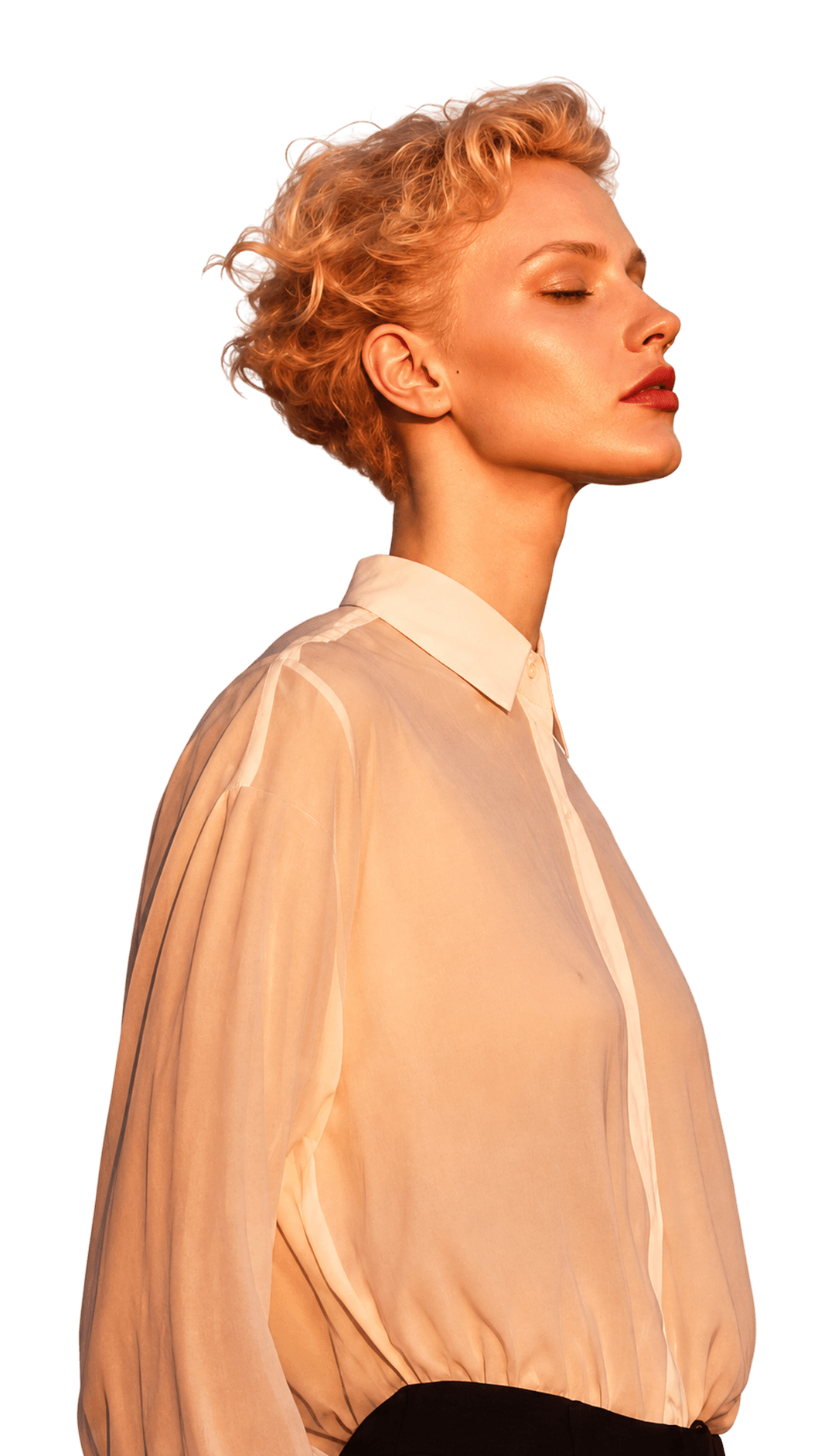 Woman in a peach shirt, seen in profile