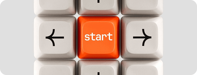 Keyboard keys with an orange start key
