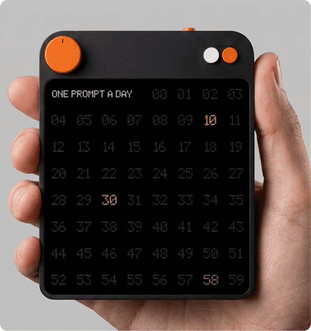 Hand holding a small device with a number grid